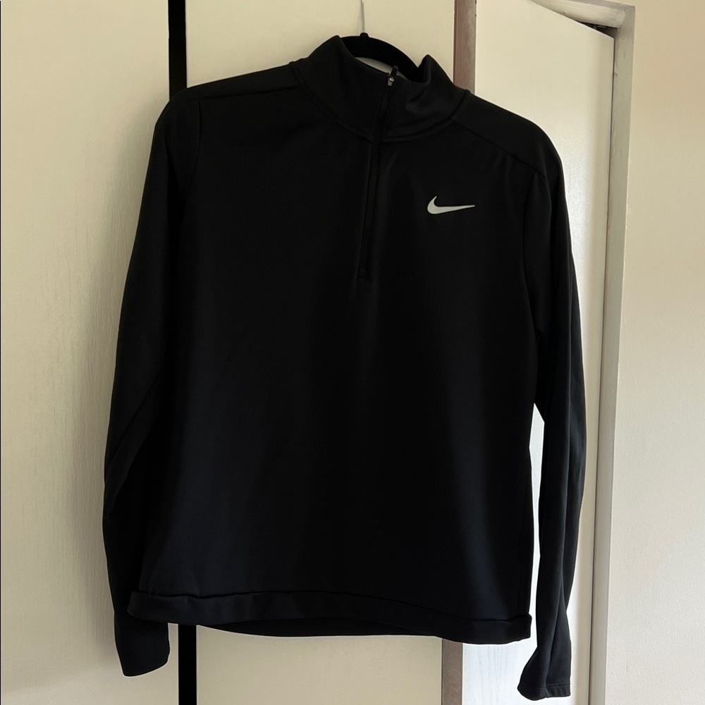 Nike Pull over. 3/4 zipper top. Nike /Black and White